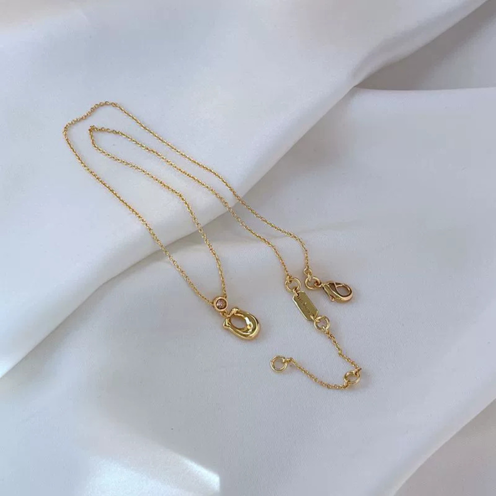 Coach Diamond Letter Horseshoe Pendant Necklace